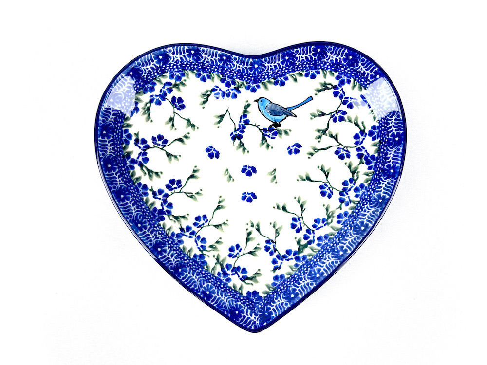 925 Bunzlau Serveerschaal Decor 1935X - 925 (Bunzlau). 925 Bunzlau ovale Serveerschaal Decor 1935X Ø 22/23 cm Hartvormige schaal om koekjes hapjes op te serveren 2nd quality; klein puntje in het glazuur.