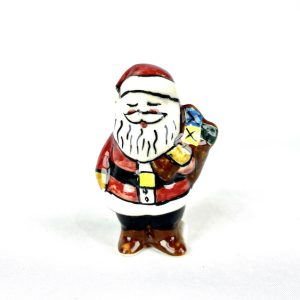 km9 Bunzlau Kerstmannetje X - km8 (Bunzlau). km9 Bunzlau Kerstmannetje X Een leuk kerstmannetje Decoratief voor de feestdagen Fabriek: Vena.