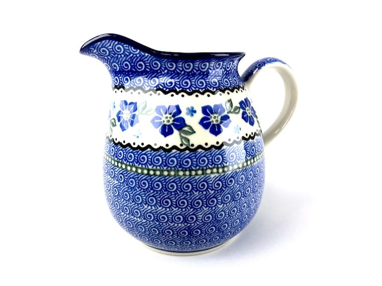 077 Bunzlau Bolle Kan 1083X - 077 (Bunzlau). 077 Bunzlau Bolle Kan 1083X Middelgroot  formaat bolle kan Water/ sap kan staat ook decoratief met een bos bloemen erin inhoud: 1