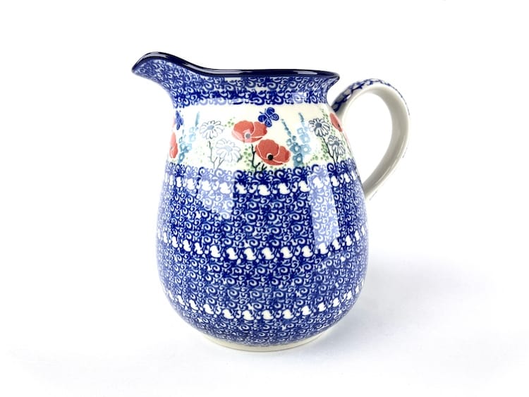 082 Bunzlau Bolle Kan 2901X - 082 (Bunzlau). 082 Bunzlau Bolle Kan 2901X Groot formaat bolle kan met mooi Kerst decor Water/ sap kan staat ook decoratief met een bos bloemen erin inhoud: 2 Liter.