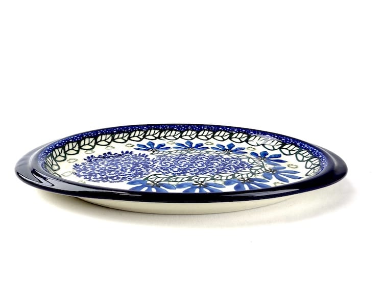 469 Bunzlau Serveer Schaaltje 1061X - 469 (Bunzlau). 469 Bunzlau Serveer Schaaltje 1061X Onderbordje voor een roomstel of voor een mok met een koekje  met een ronde uitsparing in de schotel.