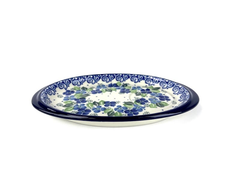 469 Bunzlau Serveer Schaaltje 1417X - 469 (Bunzlau). 469 Bunzlau Serveer Schaaltje 1417X Onderbordje voor een roomstel of voor een mok met een koekje  met een ronde uitsparing in de schotel.